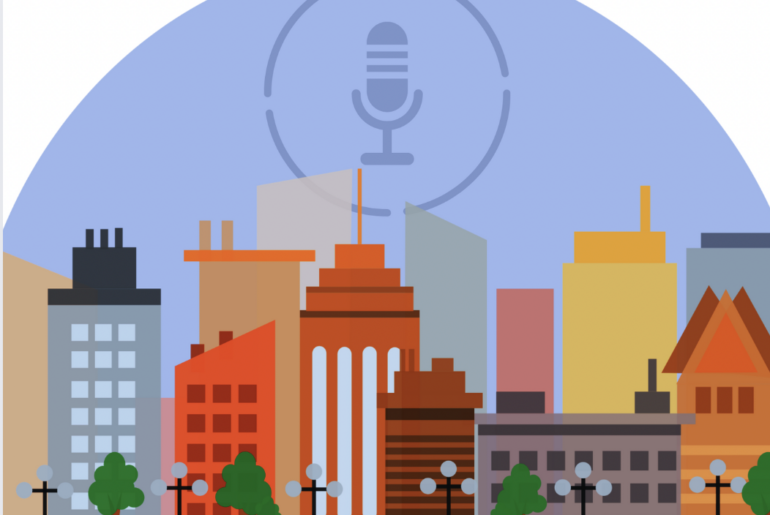 A man wears a derby hat and glasses