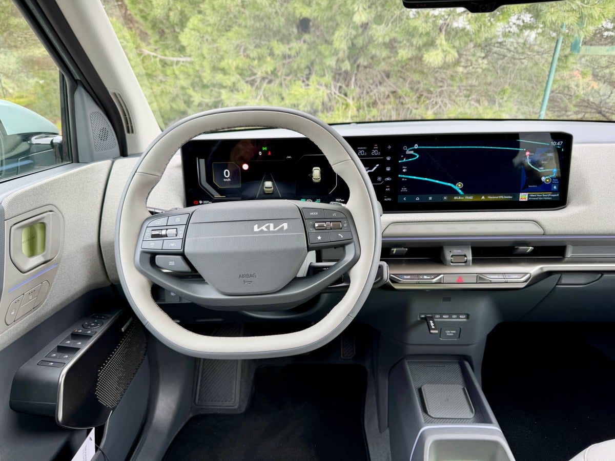 The Kia EV2 gets a twin 12-inch screen set-up, but the central touchscreen for heating and ventilation is partly obscured by the steering wheel (Steve Fowler)
