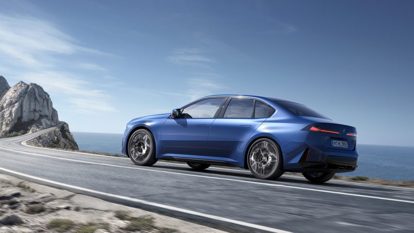 Photo of the BMW i3 driving down a coastal highway