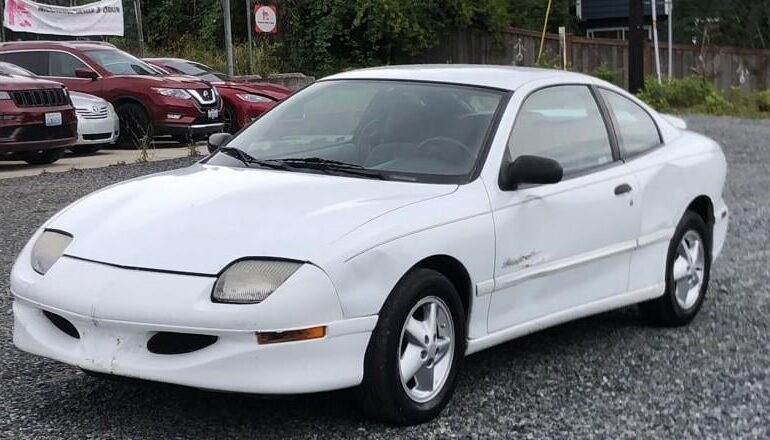 She's hot and this is her car. Do you date her?