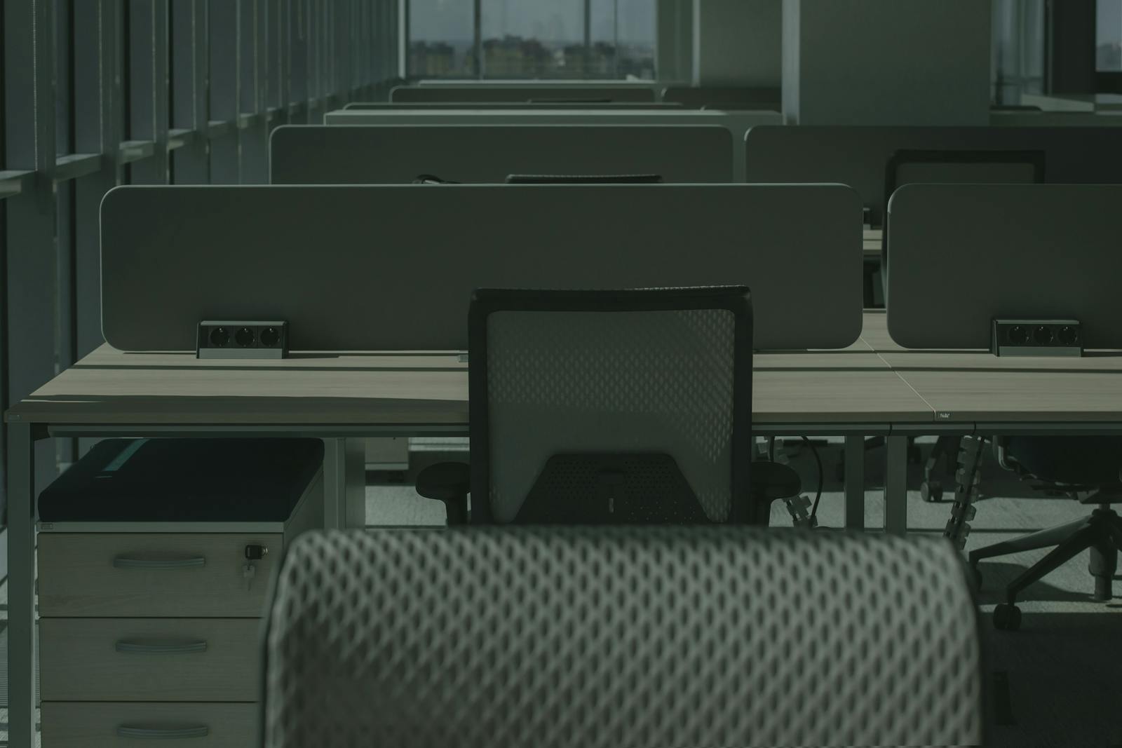 corporate layoffs office empty desks