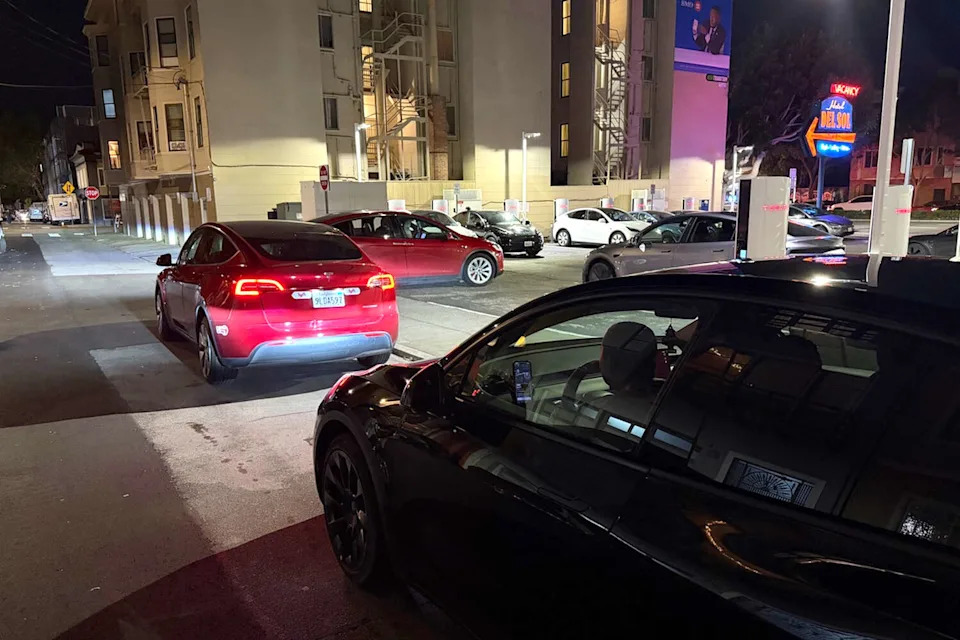 Neighbors report that drivers are entering a controversial Tesla Supercharger lot on Moulton Street despite the changes on the app. (Courtesy of Laurel Calsoni)