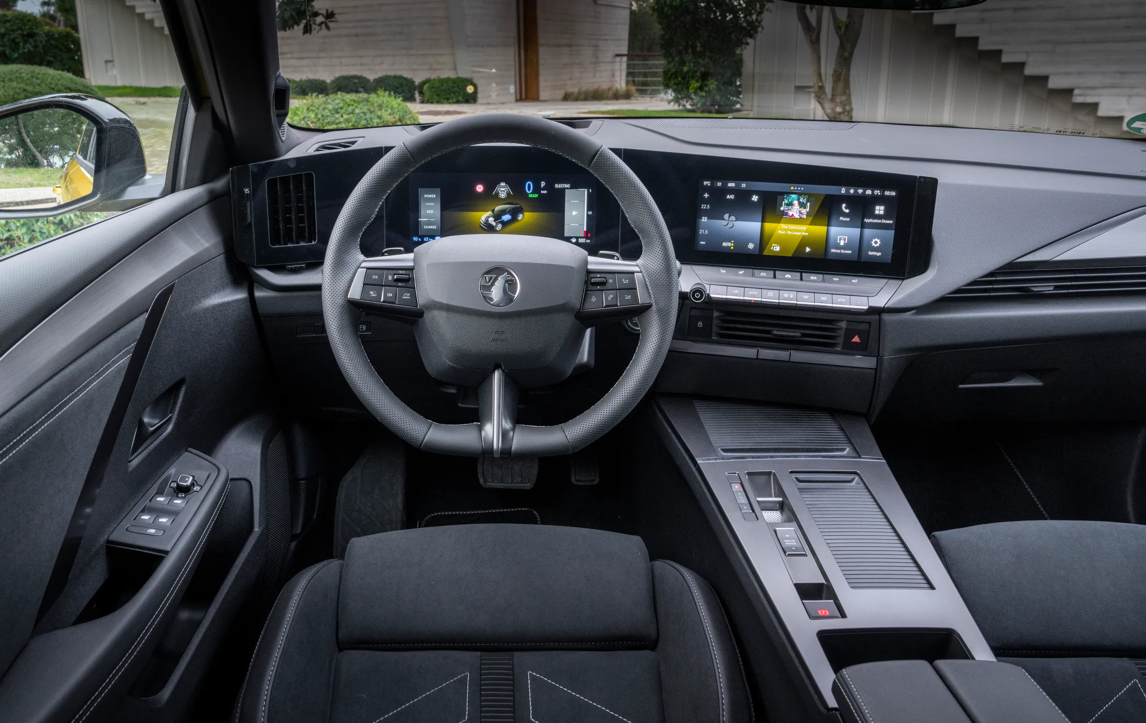 Interior view of the 2026 Vauxhall Astra Hatch, showing the steering wheel, dashboard, digital instrument cluster, and infotainment system.