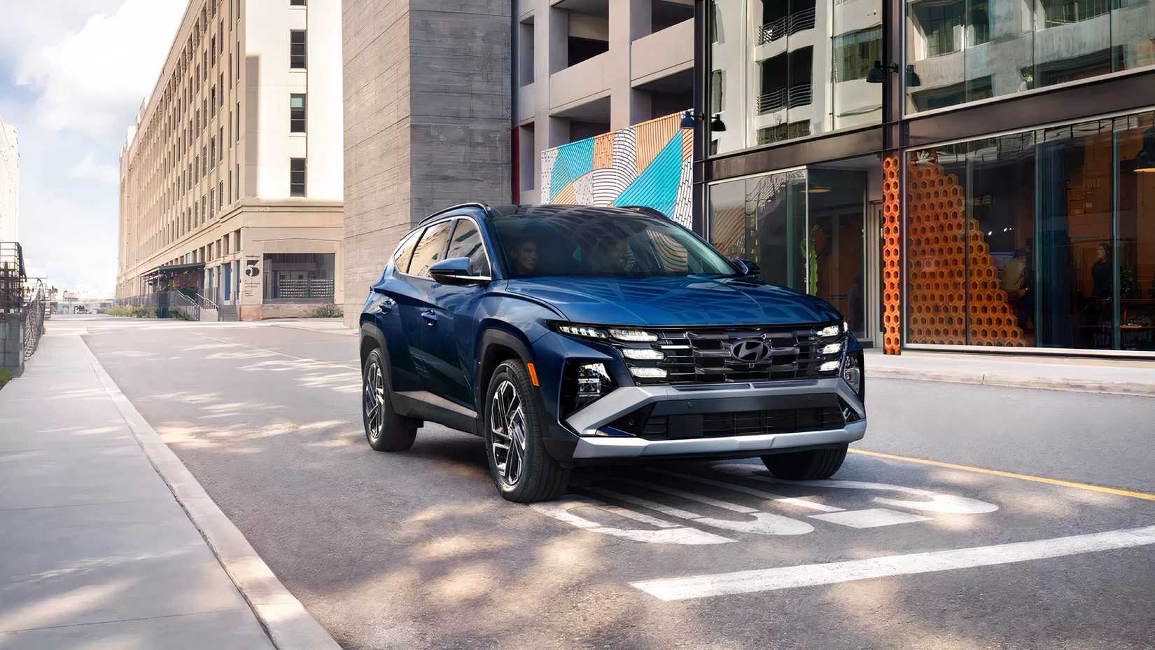 2026 Hyundai Tucson Hybrid front 3/4 action