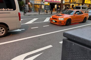 seems to be a [Nissan Skyline GT-R R34] in Japan but not too familiar.