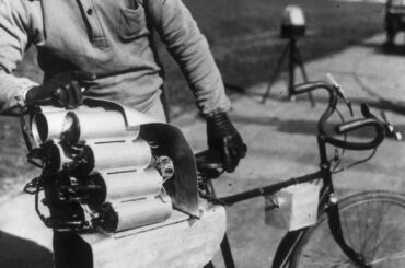 Rocket-Propelled Bicycle. In this 1931 picture, a German engineer prepares his rocket bicycle with 12 rockets mounted on the back wheel.