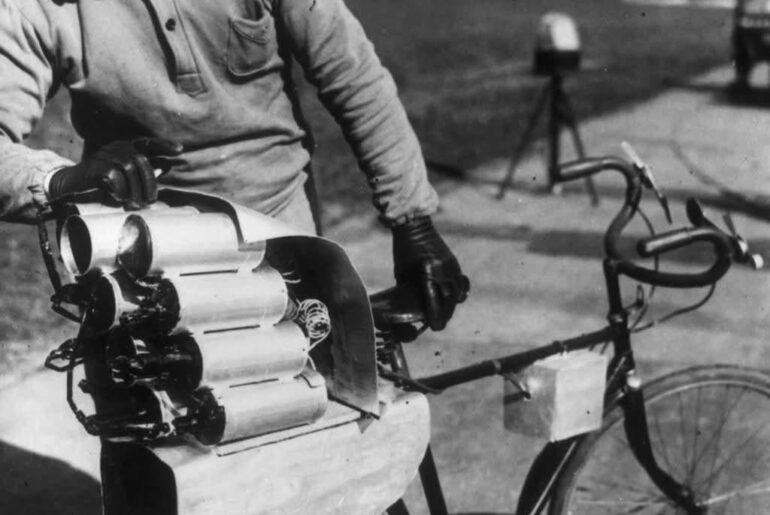 Rocket-Propelled Bicycle. In this 1931 picture, a German engineer prepares his rocket bicycle with 12 rockets mounted on the back wheel.
