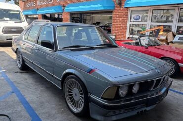[BMW Alpina B10] due to the extreme rarity of this car I’m not sure if it’s real or not, any classic BMW experts here that could identify? It did have a period correct steering wheel and was manual as well. Nonetheless, what a cool car to stumble upon.