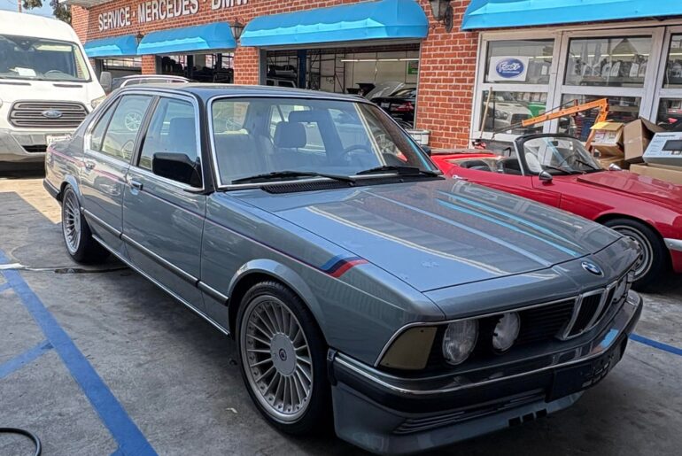 [BMW Alpina B10] due to the extreme rarity of this car I’m not sure if it’s real or not, any classic BMW experts here that could identify? It did have a period correct steering wheel and was manual as well. Nonetheless, what a cool car to stumble upon.