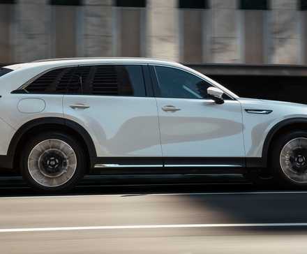 2024 Mazda CX-90 PHEV White Side View Driving