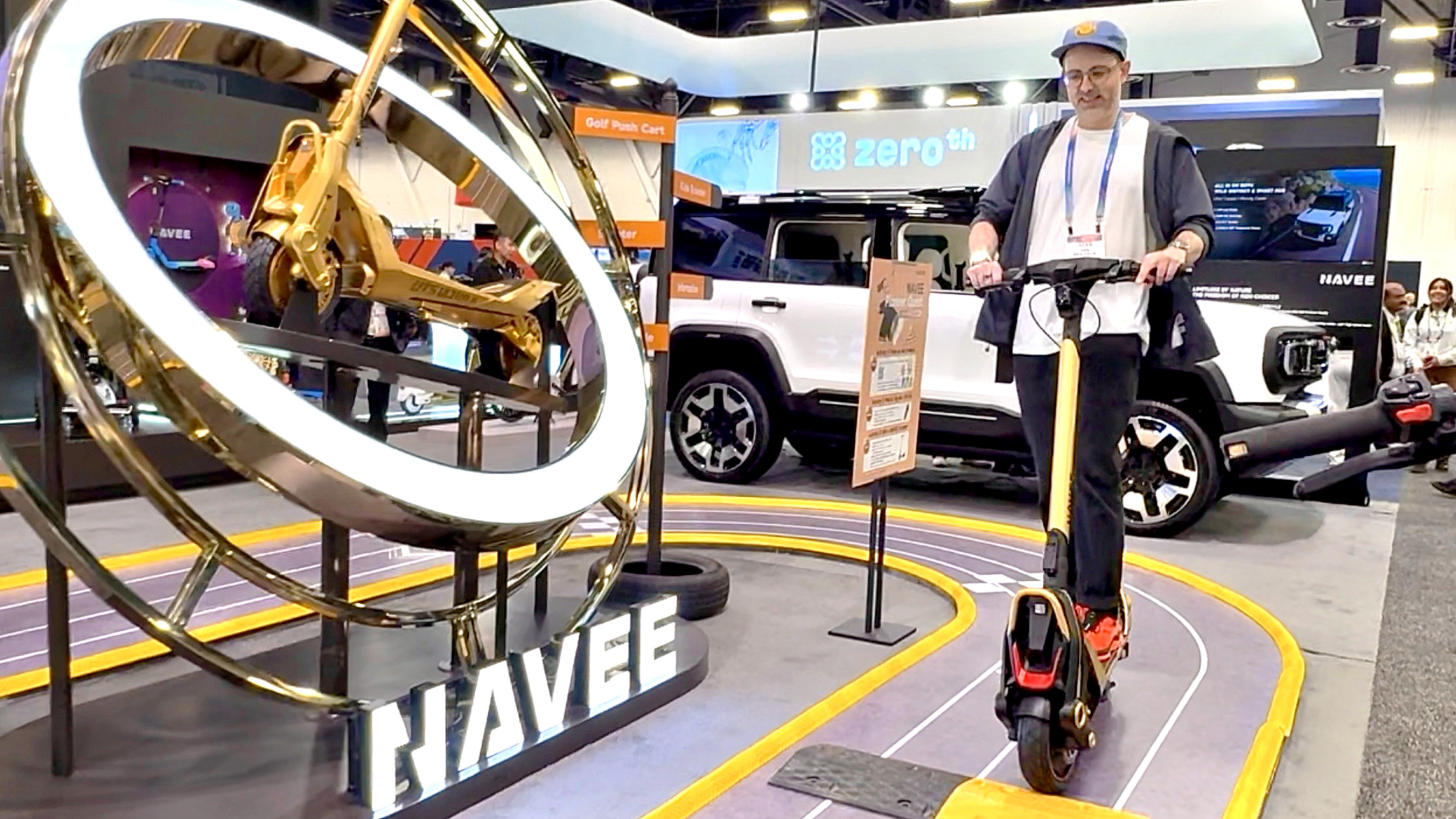 Writer Dan Bracaglia testing the Navee UT5 Ultra X electric scooter at CES 2026