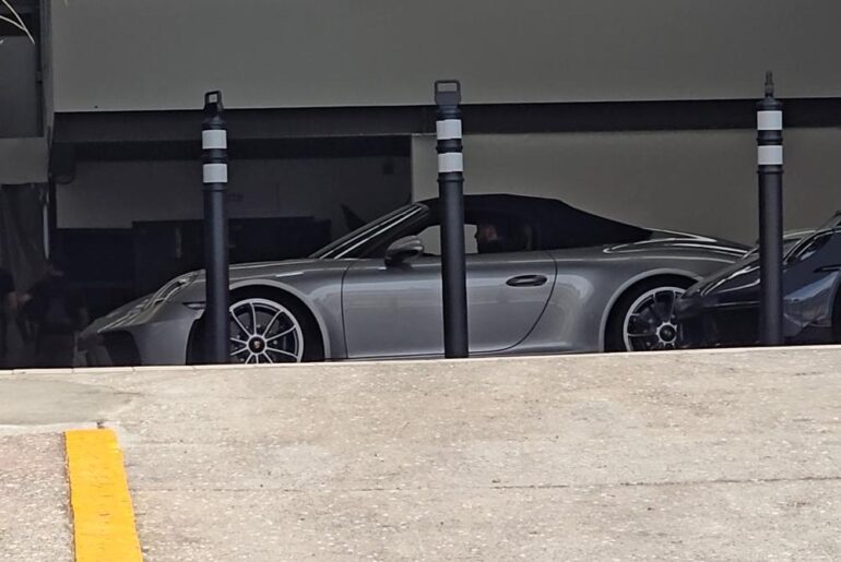 1 of the 9 [Porsche 911 Speedster] in méxico at a dealership's garage