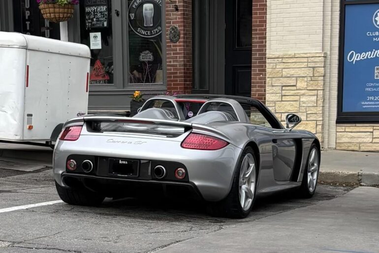 [Porsche Carrera GT] casually parked in the coffee shop lot