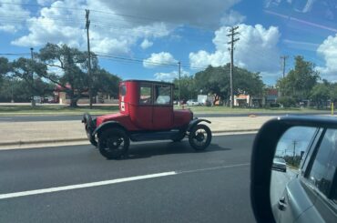Was driving in slow moving traffic when a [Ford Model T] casually passed me on the left lane.