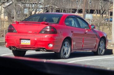 The regular cars of the McDonald's Parking lot.