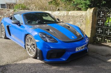 Shark Blue [718 Spyder RS] parked outside a church