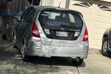 An silver Suzuki Aerio SX and more random recent spots