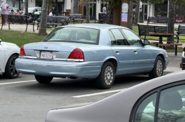 A blue Ford Crown Victoria and some more random cars from today.
