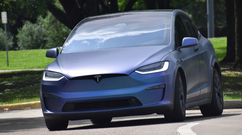 Tesla Model X driving on a road