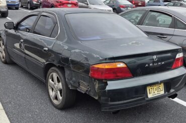 Beat up 2000 Acura TL, the official car of...