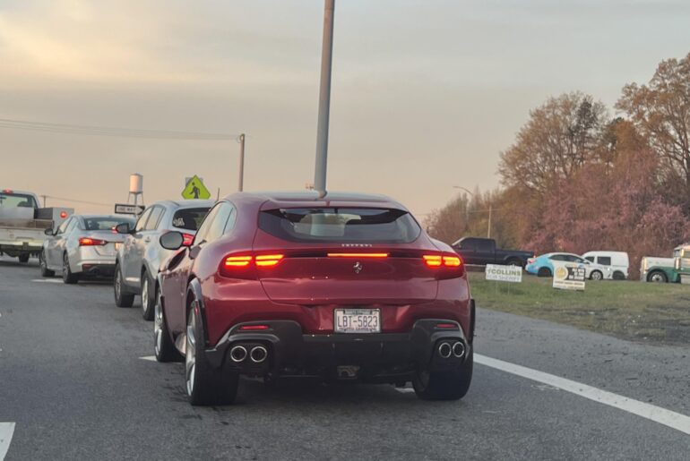 [Ferrari Purosangue] in the rough part of town