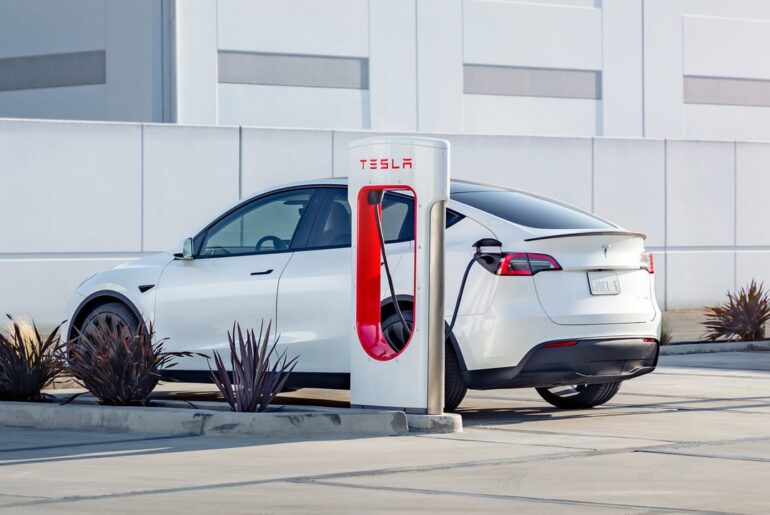 Tesla Model Y car at Supercharger station.