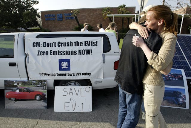 GM EV1 protestors embrace