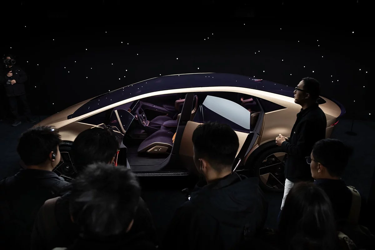 The Venus' interior is designed for luxury with dark tones, gold-chrome accents, and a whole lotta suede