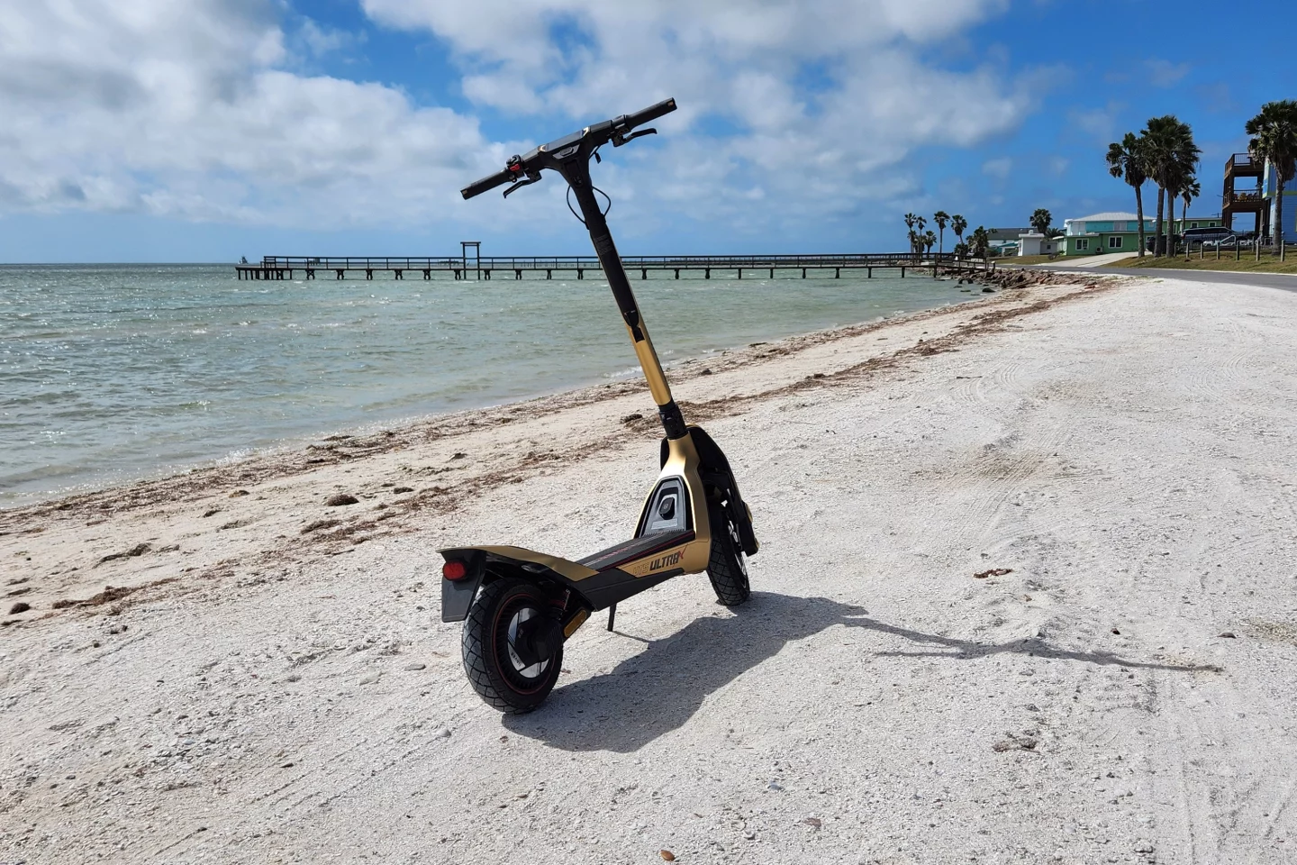 Riding around on hard-pack sand is no issue for the mighty 2WD scoot. Or even some of the softer stuff. I wouldn't hit the dunes with it though
