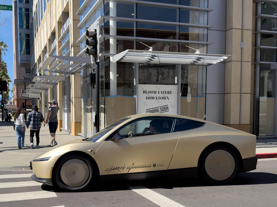 07 March 2026, USA, San Jose: A test car of the Tesla robotaxi Cybercab is on the road. The vehicles will not have a steering wheel or pedals when they are launched on the market. Tesla boss Elon Musk sees autonomous driving as the future of the electric car manufacturer. Photo: Andrej Sokolow/dpa (Photo by Andrej Sokolow/picture alliance via Getty Images)