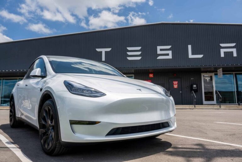 Should You Buy, Sell or Hold Tesla Stock at $390?