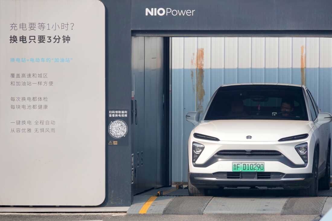 An electric vehicle is seen at NIO battery swap station on March 9, 2025 in Yantai, Shandong Province of China.