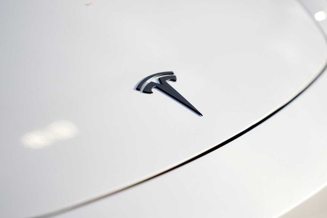 A logo for Tesla is seen on a vehicle at a Tesla facility Wednesday, April 15, 2026, in Portland, Ore.