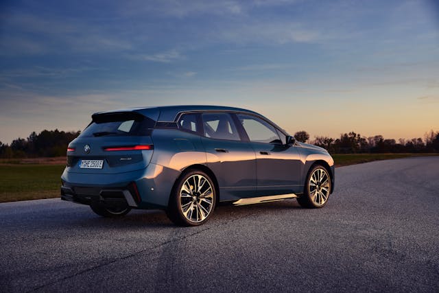 BMW iX exterior rear three quarter passenger side