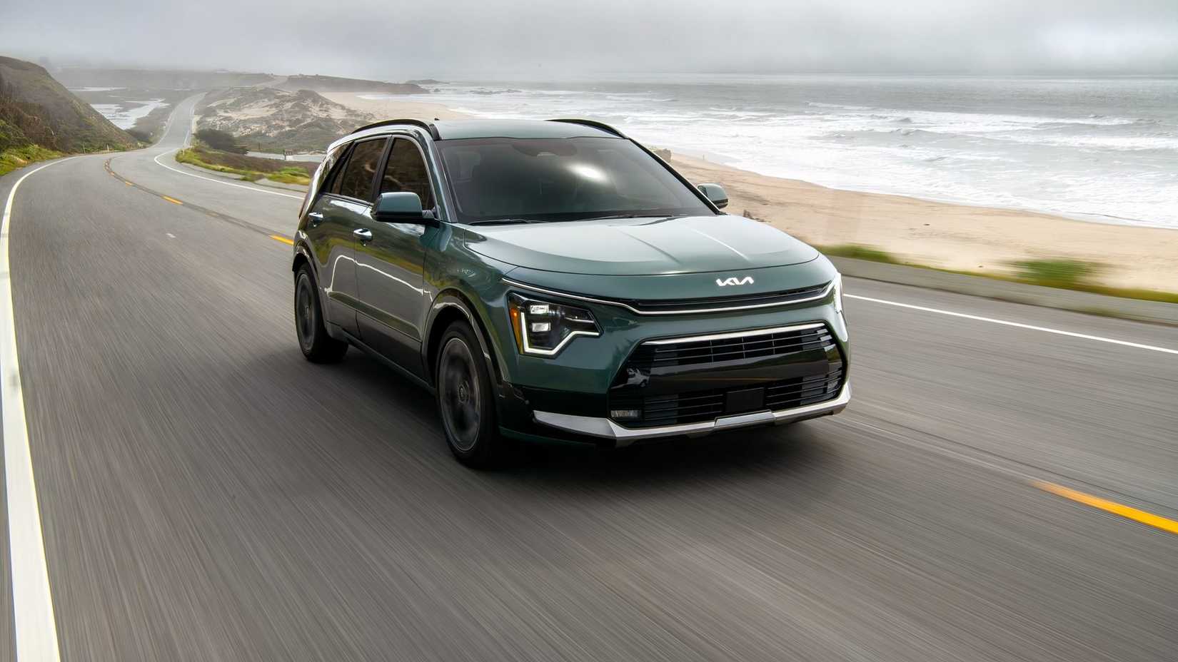 2026 Kia Niro Hybrid Front 3/4 Driving Shot Beach