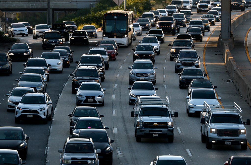 Traffic moves along a highway in Los Angeles.