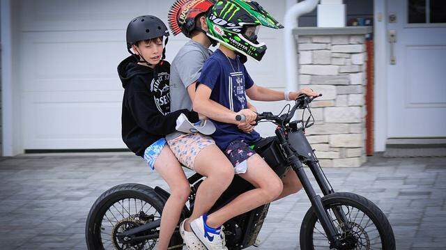 Fort Worth residents have strong opinions about electric bikes and scooters. In certain areas, they’’ve become a danger, some say. In this file photo, kids ride an e-bike on May 25, 2025, in Point Pleasant, New Jersey.