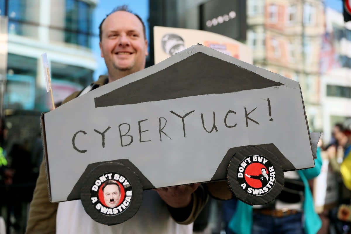 Tesla's once-vaunted Cybertruck has become a symbol of derision for many people in the wake of CEO Elon Musk's foray into right-wing politics. A Cybertruck owner in Mississippi is now suing the company over his vehicle, claiming the brand-new SUV became a lemon before he even drove off the lot (Getty Images)