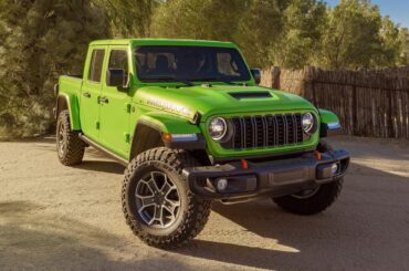 Metallic green Jeep Gladiator, the official car of?