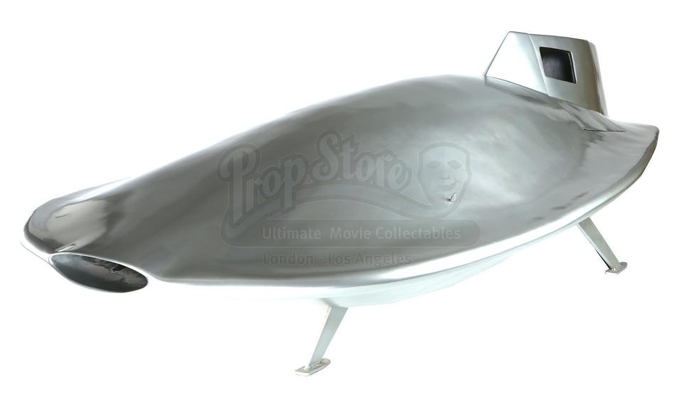 futuristic metallic spacecraft model with sleek design