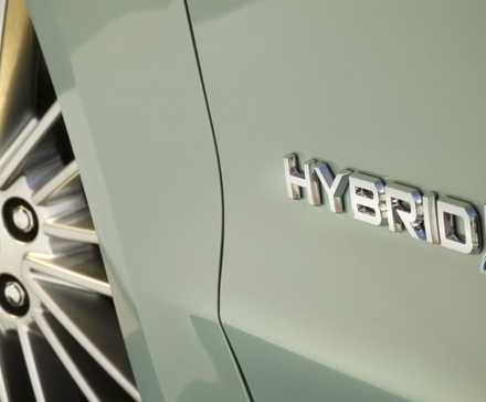 2015 Ford Fusion Hybrid badge close up