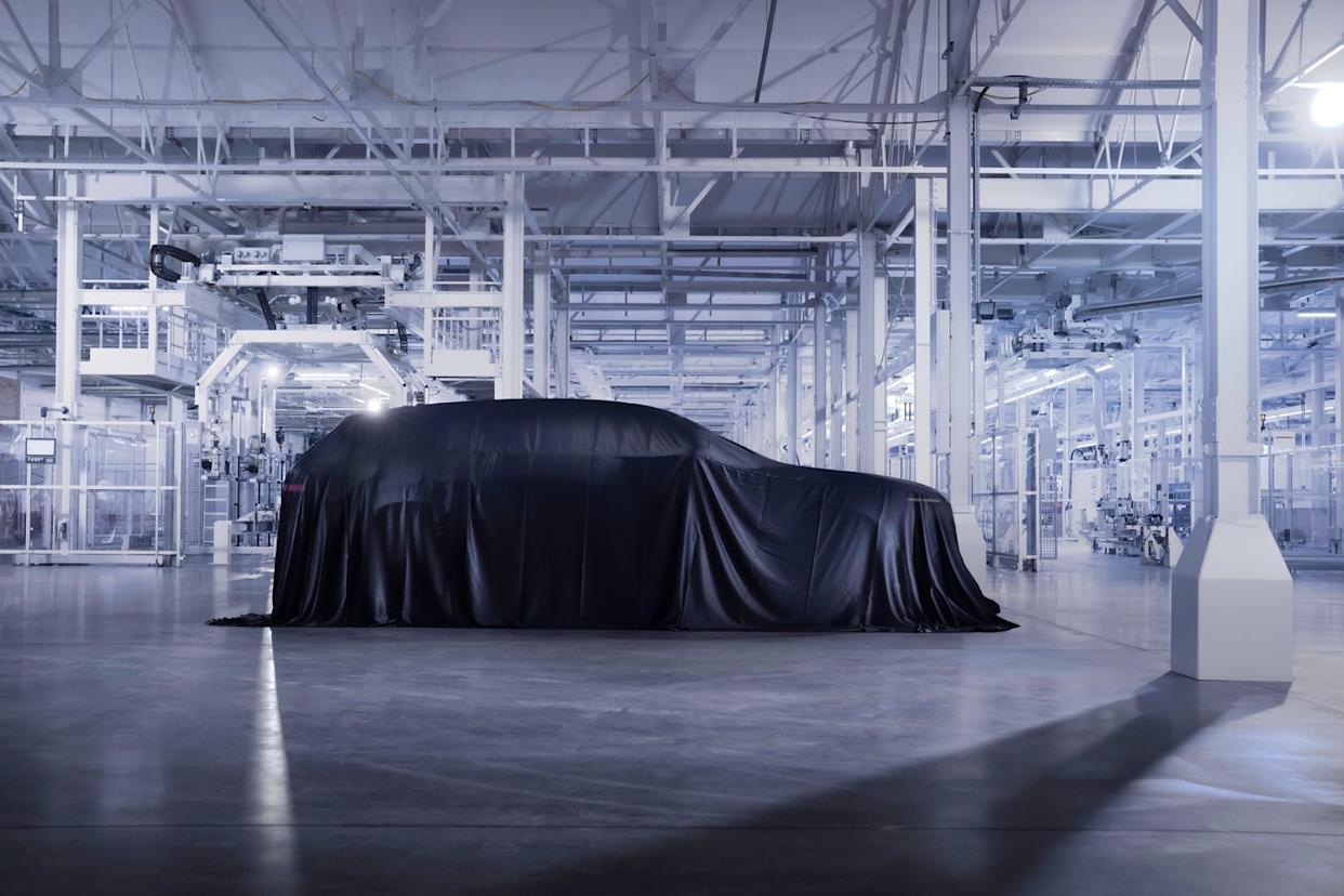 covered vehicle in a factory setting