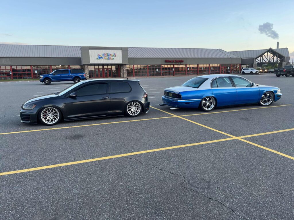 Driving my highschool car from the 2000s and I parked by another low car