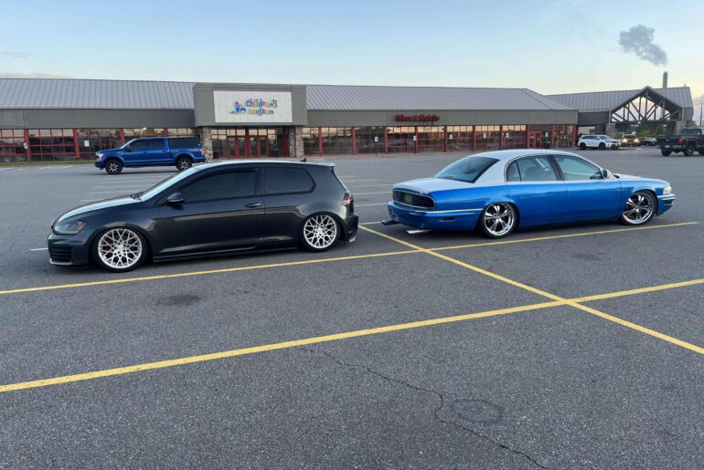 Driving my highschool car from the 2000s and I parked by another low car