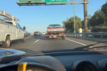 [Multi] A classic Chevy Impala being towed and a Honda S2000 with a wine colored soft top