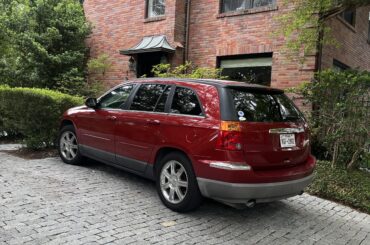 Red 1st gen Chrysler Pacifica