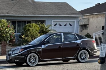 A lot of people show cool or interesting cars; I had to share whatever this abomination is [Hyundai Elantra?]