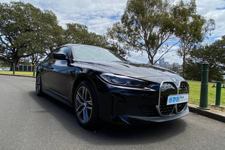 BMW i4 eDrive35 side view Origin Energy summer promo