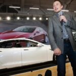 Tesla (TSLA) CEO Elon Musk presenting the Tesla Model S luxury electric sedan to the world in 2012 at the automaker's Fremont factory.