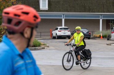 Debbie Lavin of Prairie Village rides her E-bike to meet with a group of riders known as Rif Raf, on Wednesday, Sep. 24, 2025, in Prairie Village.